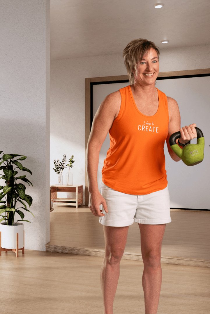 Create | Orange sleeveless activewear top for women - Empowered Clothing - stride