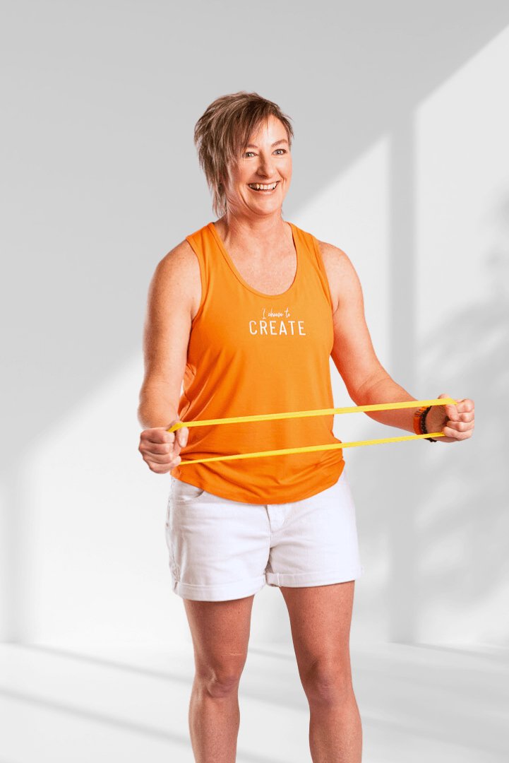 Create | Orange sleeveless activewear top for women - Empowered Clothing - stride