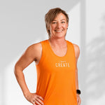 Create | Orange sleeveless activewear top for women - Empowered Clothing - stride