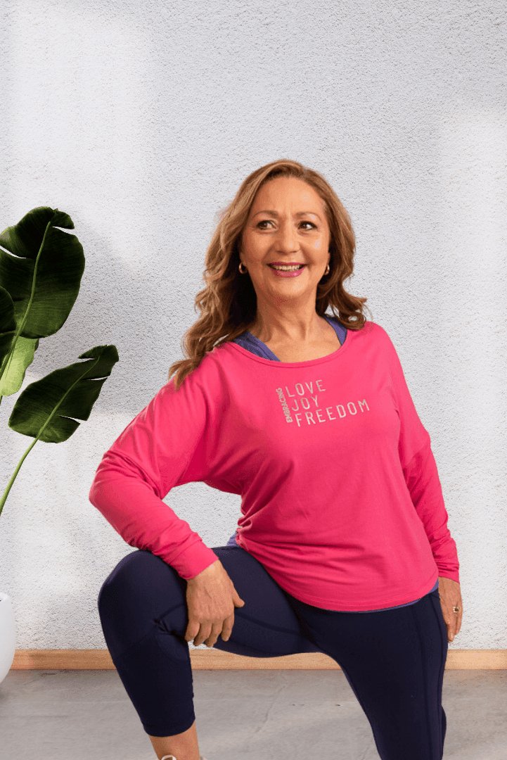 Embracing | Pink long sleeve activewear top for women - Empowered Clothing - stride