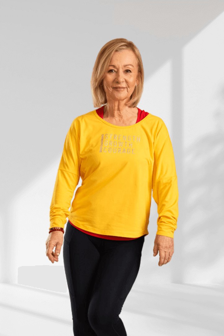 Empowering | Yellow long sleeve activewear top for women - Empowered Clothing - stride