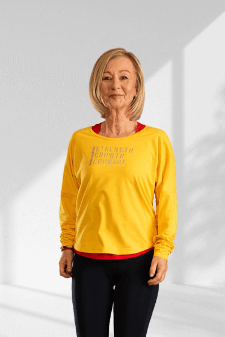 Empowering | Yellow long sleeve activewear top for women - Empowered Clothing - stride