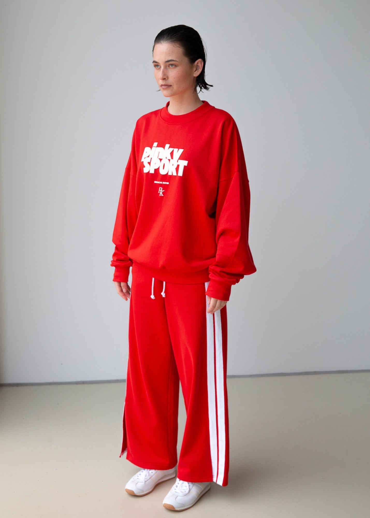 PK x ICONIC - Wide Leg Trackpant - Red - Pinky & Kamal - stride