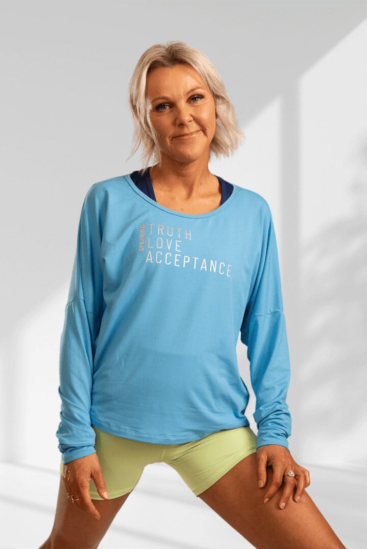 Speaking | Pale blue long sleeve activewear top - Empowered Clothing - stride